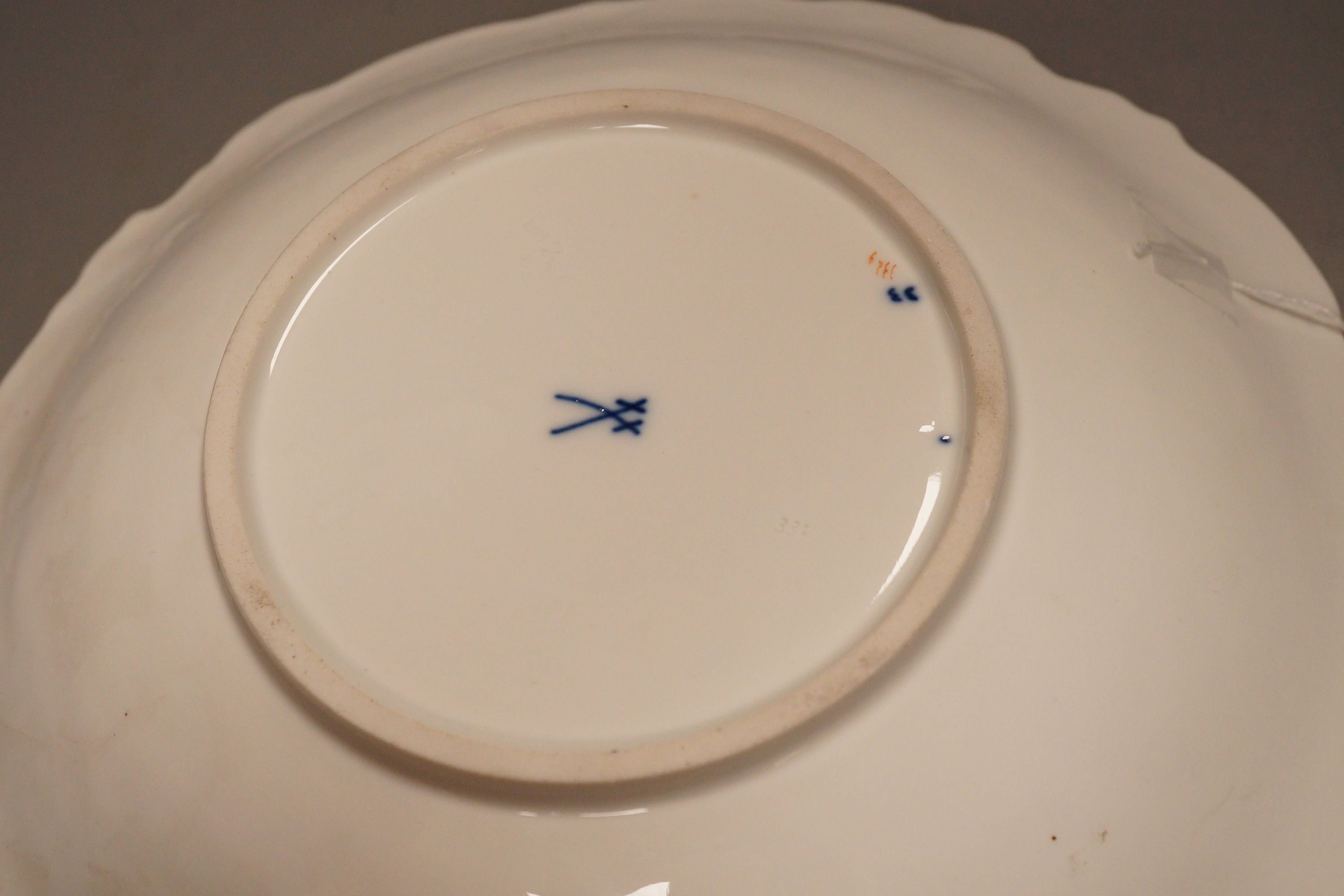 An early 20th Meissen century gilt floral blue and white dish, 27.5cm diameter